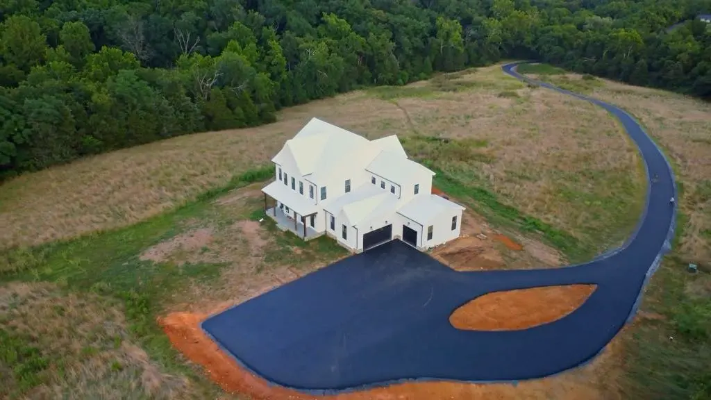 beautiful long driveway installation and asphalt paving completed in Northern Virginia Haymarket