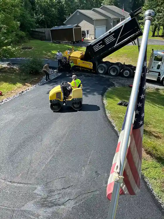 north virginia's asphlat paving company with its team and machinery in action