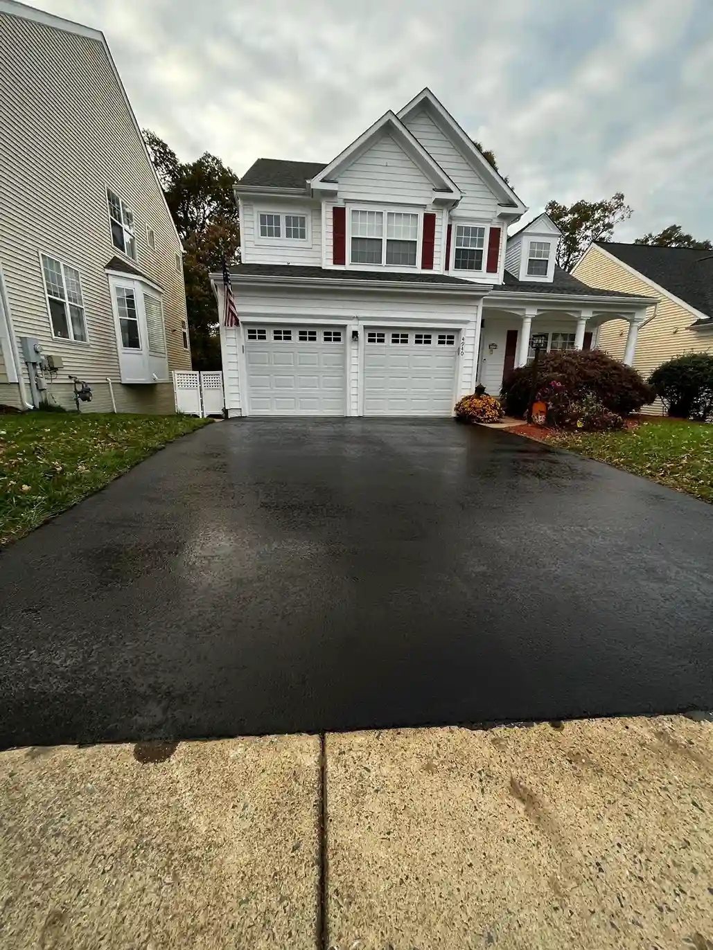 Sealcoated driveway providing curb appeal for a home in prince william county virginia