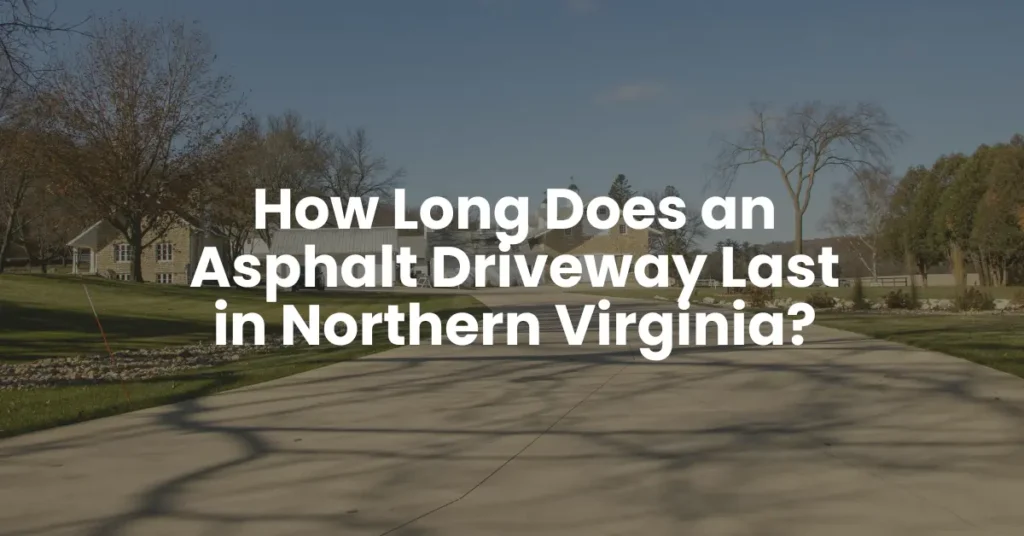 Wide residential asphalt driveway leading to a suburban home with trees and open landscaping in Northern Virginia on a clear day.